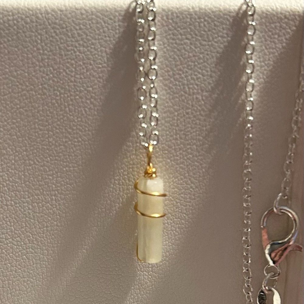 Elegant Gold and Silver Pendant Necklace